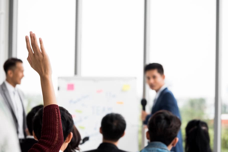 hand raised during company training